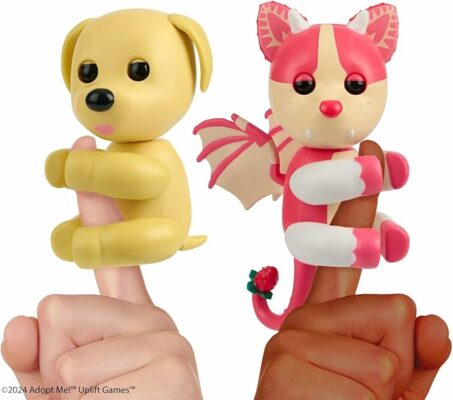 YOUR FAVORITE GAME COMES TO LIFE. Adopt Me fans can now collect and care for their favorite pets in real life. This Adopt Me!: Strawberry Shortcake Bat Dragon comes to life on your finger. INTERACTIVE PET WITH 40+ SOUNDS AND REACTIONS. Hear your legendary pet coo, giggle and even give you a kiss. Your touch brings your pet to life with a moving head, blinking eyes and so many cute sounds. CARE FOR YOUR PET IRL. Care for your pet like you would in the game. Each pet responds to your touch with sensors on their head and mouth. Pet them to show your love. Feed them, kiss them, and even play peek-a-boo. They also have motion sensors that detect when you flip them, shake them and rock them to sleep. THEY GO WHERE YOU GO. These pets love to go everywhere with you. Their portable size makes them easy to take with you. COLLECT BOTH ADORABLE PETS. Fans can collect both the Dog and the legendary Adopt Me!: Strawberry Shortcake Bat Dragon. Batteries included.